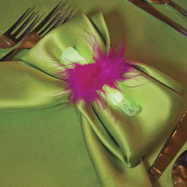 Green detail of a napkinholder made of pink feathers and a glow stick from a fashionista Bat Mitzvah, Boston Event Planner, Boston Event Planning, Boston Event Stylist, Boston Event Styling
