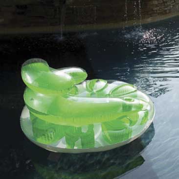 Green detail of an inflated chair float for a backyard birthday pool party; Boston Event Planner, Boston Event Planning, Boston Event Stylist, Boston Event Styling